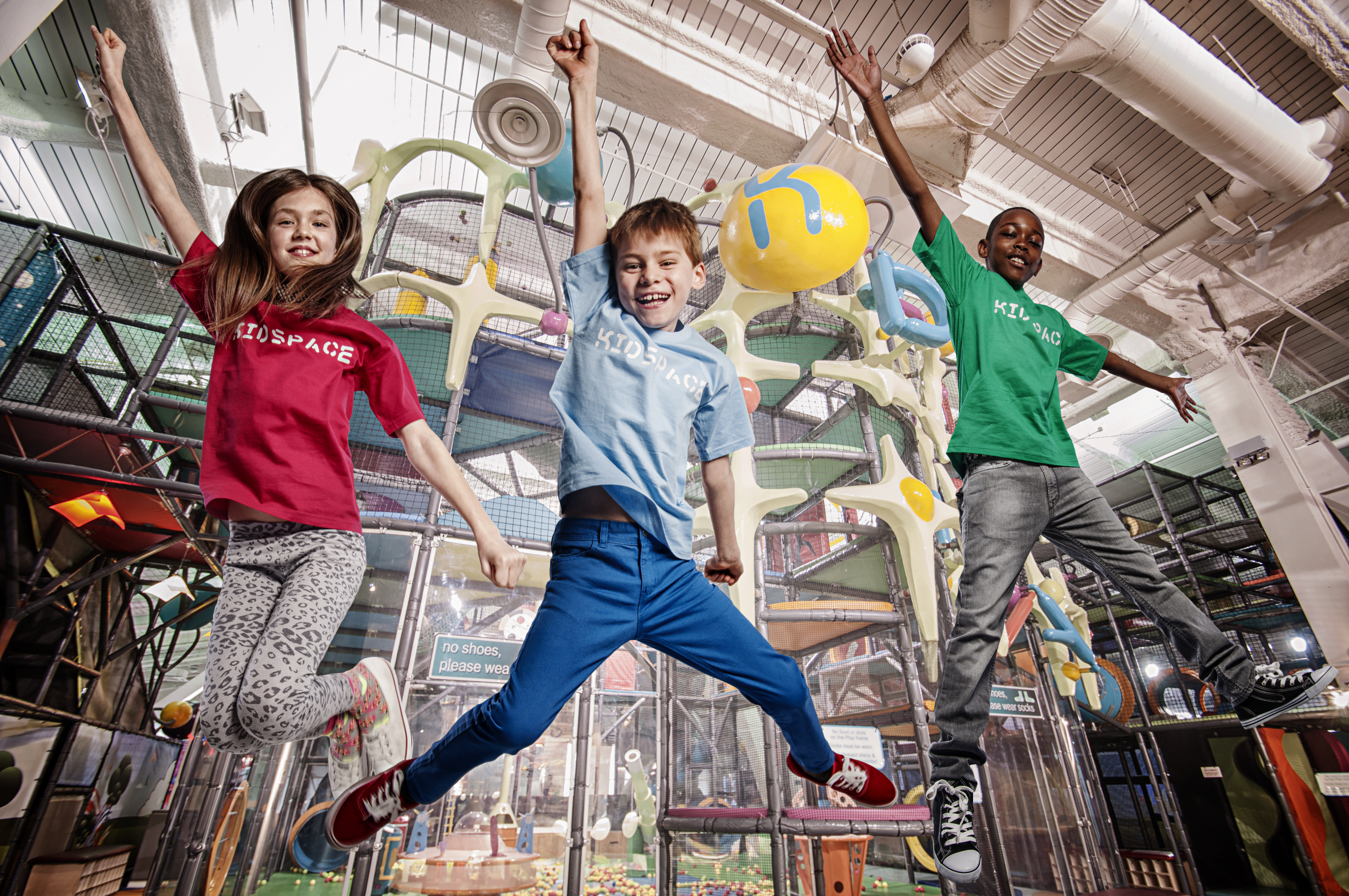 Children jumping and playing at Kidspace Romford soft play during a birthday party celebration